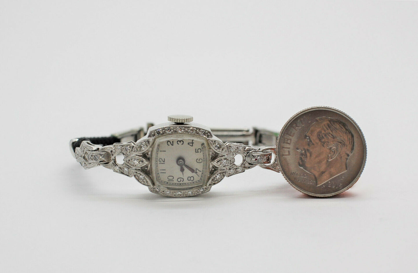 Vintage Platinum Ladies Diamond Watch 14mm Dial (0.17 CTTW)