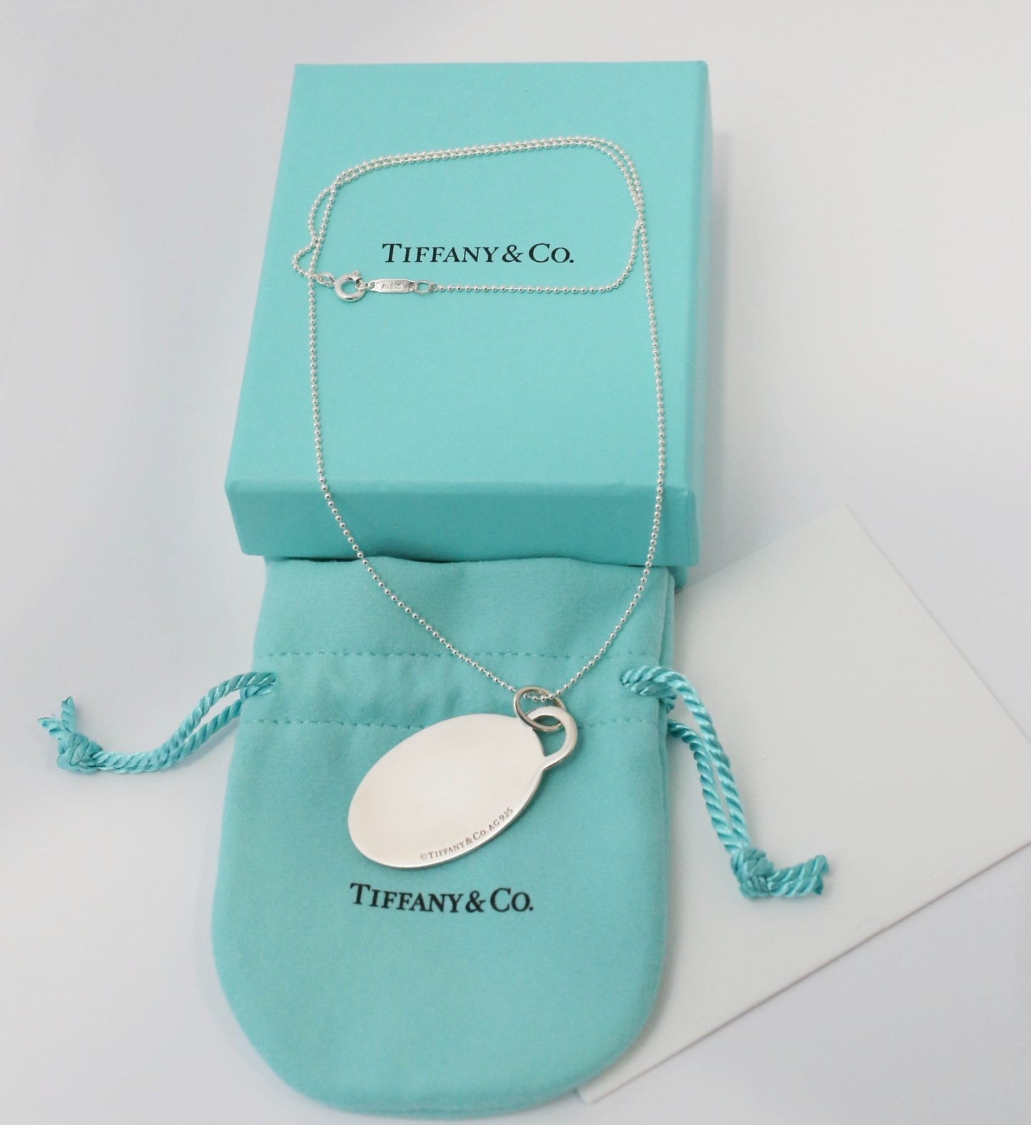 Tiffany & Co Sterling Silver Blue Splash Oval "Please Return to Tiffany" Necklace, 18 inches