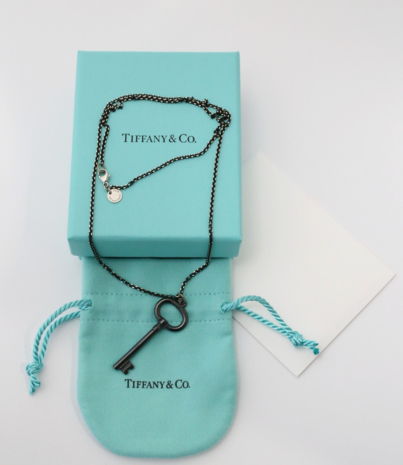 Tiffany & Co Sterling Silver Titanium Key Pendant Necklace, 20 inches