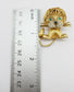 Circa 1950's Vintage 14k Yellow Gold Hematite Diamond & Emerald Lion Pin Brooch